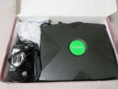 An Xbox games system and assorted games - unchecked