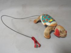 A vintage tin plate Mobo puppy