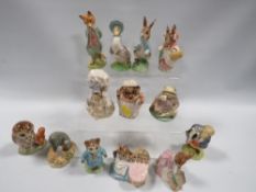 A collection of thirteen assorted Beswick and Royal Albert Beatrix Potter figures