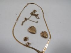 A hallmarked 9ct gold chain together with a 375 example and some scrap yellow metal links and gold