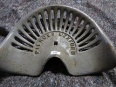A cast iron Walter and Wood tractor seat - possibly reproduction