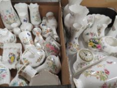 Two trays of assorted ceramics to include a large selection of Aynsley vases, ornamental china