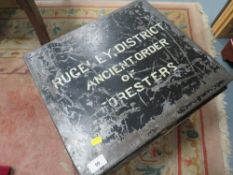 A black enamel deed style metal trunk