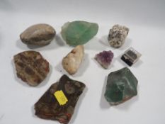 A small tray of assorted geological specimens, quartz etc