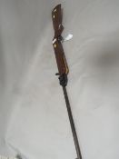 A vintage air rifle with calibrated sight