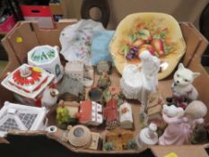 A tray of assorted ceramics to include collectable teapots, Old Tuptonware cat etc
