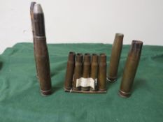 A COLLECTION OF WW2 SHELL CASES, of German 2cm anti-aircraft rounds dated 1944 and a clip of K39