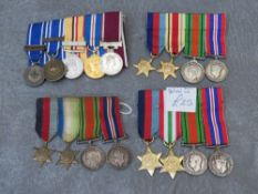 FOUR BARS OF MINIATURE DRESS MEDALS, to include WW2 and NATO types