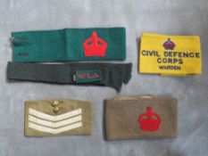 A WWI DERBY SCHENE ARMBAND, along with a Women's Land Army armband & title and two later armbands