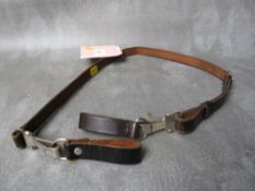 A 1988 DATED GERMAN OFFICERS CROSS STRAP, the fittings with RZM marks and makers mark for Assman