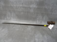 A MARTINI HENRY 1876 BAYONET, with fullered triangular blade, marked W.D. with broad arrow above,