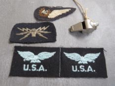 R.A.F. INTEREST, consisting of a WWI air crew whistle, an A.G. cloth wing wireless operator patch