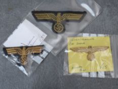 KRIEGSMARINE METAL CAP EAGLE (MARKED A41), along with an Officers bullion eagle and a cloth example