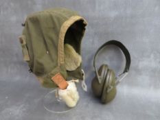 A US ARMY AIR CORPS FLYING HELMET A.9., and a pair of ear protectors