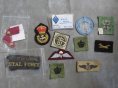 A COLLECTION OF MILITARY CLOTH BADGES ETC., to include WWII US air crew insignia, a S/Staffs 2nd