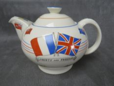 A CROWN DUCAL 'WAR AGAINST HITLERISM' SOUVENIR TEA POT, made for Dyson & Horsfall of Preston, to