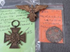 A WW2 GERMAN VETERANS BREAST EAGLE BADGE, Mecklenburg Veterans Assoc. badge and a Flanders cross