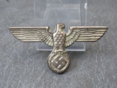A WW2 GERMAN METAL CAP EAGLE MARKED R2M MI/8