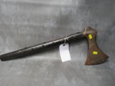 A REPLICA VIKING WAR AXE, an iron head in wooden handle with metal stud decoration to the shaft, L
