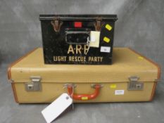 A 1939 DATED ARP FIRST AID TIN BOX, marked 'Light Recue Party', A/F, along with a demob suitcase (