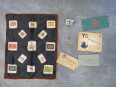 A SMALL BOX OF MILITARY AND HOME FRONT COLLECTABLES, to include a copy Women's Land Army armband,