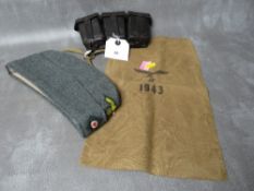 A WW2 GERMAN THREE SECTION AMMO POUCH DATED 1943, a German cloth bag dated 1943 and a replica side