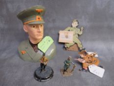 A GERMAN OFFICIAL BUST DESK ORNAMENT AND MILITARY RELATED TOYS, to include lead figures of German