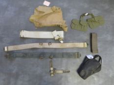 A QUANTITY OF WWII ERA BELTS AND POUCHES ETC., to include a ladies gas mask, hand bag and a 1944