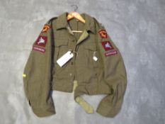 A BRITISH ARMY BATTLE DRESS BLOUSE BADGED SOUTH STAFFORDSHIRE AIRBOURNE