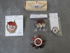 A SMALL COLLECTION OF USSR BADGES, consisting of Order of The Rod Banner, Order of The War of The