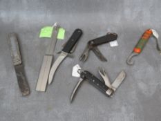 A 1998 PARA CUT AWAY KNIFE, with US Para escape knife, two clasp type knives and a 1939 GPO knife (