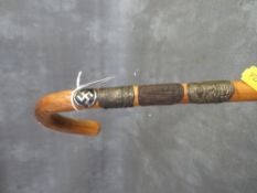 A 1930S GERMAN / AUSTRIAN ALPINE WALKING STICK, with attached metal badges