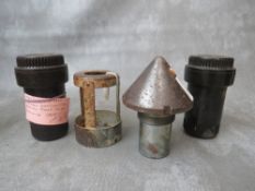 A 1 TON BOMB FUSE (INERT), two German Luftwaffe bakelite bomb fuse cases and a German Krupp fuse