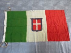 A WW2 ITALIAN FLAG, green, white and red with central shield, A/F, 136 x 67 cm