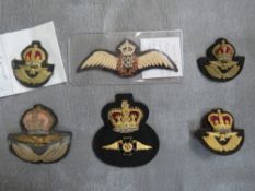 R.A.F. INTEREST, consisting of WWII type cloth wings, 4 official type hat badges and an RAF