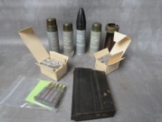 A TRAY OF VARIOUS INERT EX TRAINING ROUNDS ETC., to include rubber bullets, boxed Russian 7-26 drill