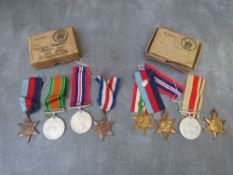 TWO WW2 MEDAL GROUPS IN POSTAL BOXES, the first 39-45 star, Africa star, Italy star and War Medal to