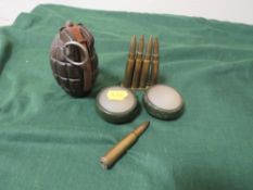 A BRITISH No. 36 MKI GRENADE (INERT), a clip of five inert bullets and 2 WD marked lens