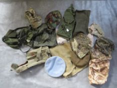 A TRAY OF ASSORTED WEBBING AND COVERS, to include bags, tropical combat hat etc.