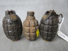 TWO MILLS BOMB GRENADES, dated 1916 A/F, along with another grenade, all A/F, all inert (3)