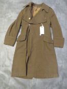 A BRITISH ARMY OFFICERS GREAT COAT, with stay bright buttons