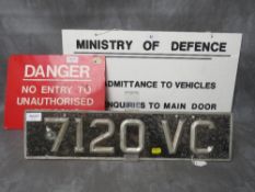 A PLASTIC MINISTRY OF DEFENCE 'NO ADMITTANCE TO VEHICLES' SIGN, together with a Danger sign and a