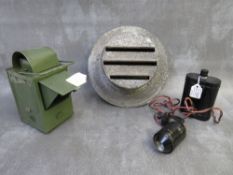 A WWII RESCUE HELMET LAMP, a green painted lantern and a WW2 blackout headlight cover