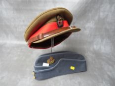 AN R.A.F. AIR VICE MARCHALL SIDE CAP, with bullion thread badge, along with an Army Colonel peak cap