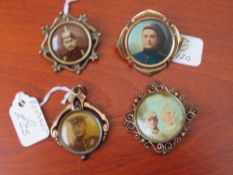 FOUR WWI GERMAN SWEETHEART PHOTOGRAPHIC BROOCHES / PENDANTS, all depicting soldiers in uniform (4)