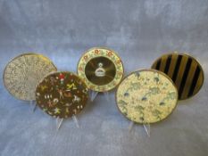 FIVE LARGE CIRCULAR VINTAGE VOGUE GARNITES POWDER COMPACTS, to include a lace pattern example,