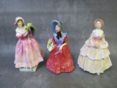 A ROYAL DOULTON 'THE NEW BONNET' FIGURINE HN1728, 'Lady Betty' figure HN1967 and 'Irene' figure