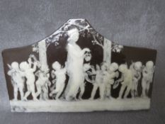 MARC-LOUIS SOLON FOR MINTON - A SHAPED PATE-SUR-PATE PLAQUE, decorated in a white slip with a