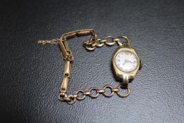 A 9 CARAT GOLD WRIST WATCH IN PRESENTATION BOX, approx weight 12.6g, D 1.75 cm