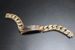 A HALLMARKED 9 CARAT GOLD I.D. BRACELET, approx weight 106.7g, L 22 cm